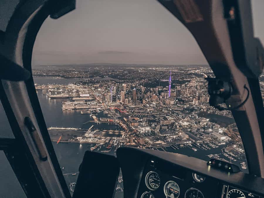 Auckland: 36 min scenic helicopter flight - Coast to Coast - Back Over Auckland: Sky Tower, Viaduct Harbour, and Harbour Bridge Views
