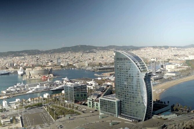 Barcelona Official Helicopter Tour with In-flight Video - Barceloneta Beach and Mar Bella: Coast Views Without the Long Walk