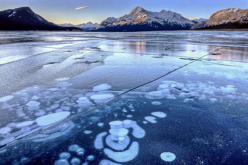 Canadian Rockies: Abraham Lake Ice Bubbles Helicopter Tour - Landslide Lake Snowshoeing: Where the Day Slows Down