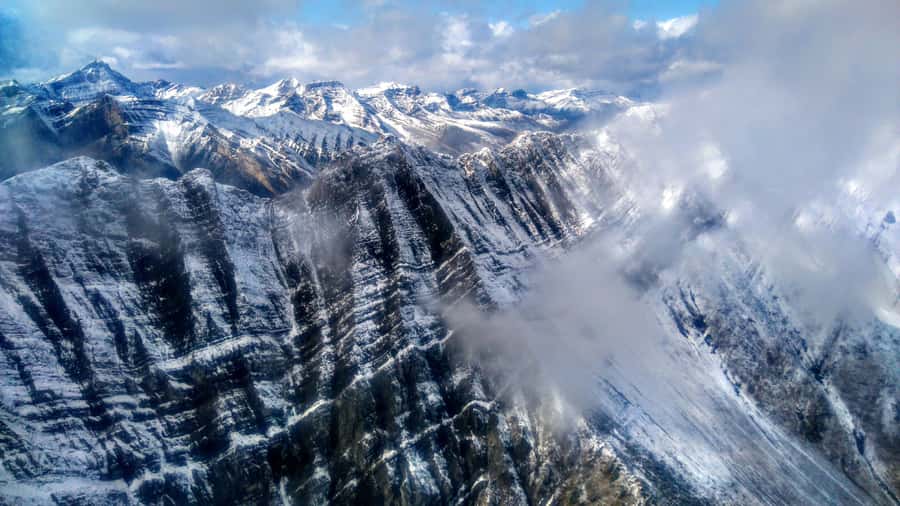 Canmore: 25-Minute Three Sisters Helicopter Tour - Stewarts Gap back to Canmore: the route closes with a view