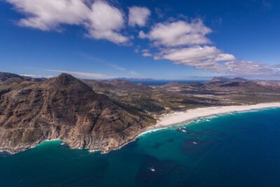 Cape Town: 25min Helicopter Flight with Complimentary Boat Cruise - Flying the city: Table Mountain, stadiums, and the coast’s switch-up