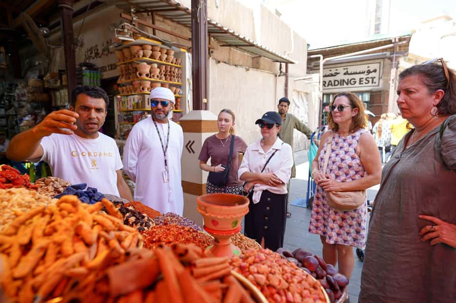 Dubai: Helicopter Ride, Old Town Walking Tour, Abra & Snacks - The helicopter ride: 12 minutes over Dubai’s loudest icons