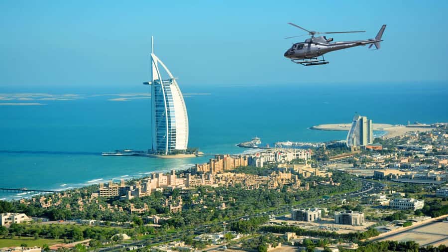 Dubai: Helicopter Ride, Old Town Walking Tour, Abra & Snacks - Al Fahidi walking tour: wind towers, narrow lanes, and history you can see