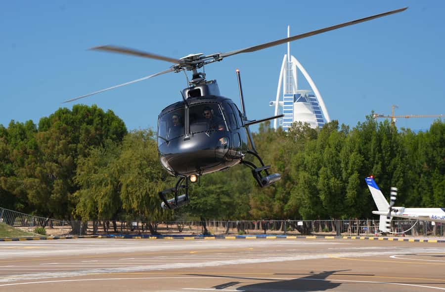 Dubai: Helicopter Ride, Old Town Walking Tour, Abra & Snacks - Al Khayma Heritage Restaurant: Arabic coffee with dates and local snacks