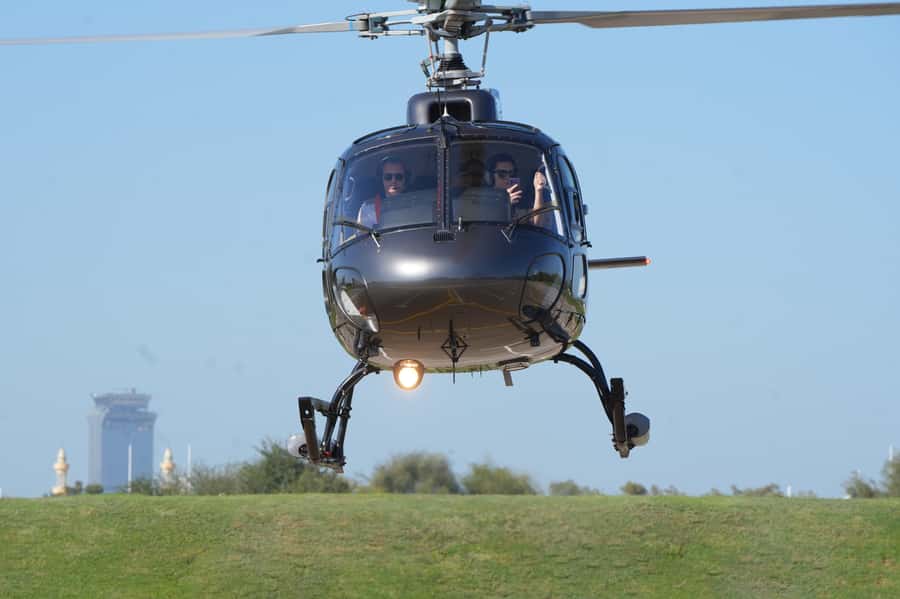 Dubai: Helicopter Ride, Old Town Walking Tour, Abra & Snacks - Abra across Dubai Creek: the old transport method still does the job