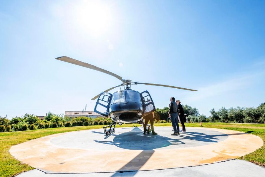 Fiumefreddo: Group Flight Helicopter Tour over Etna - The ascent: Piedimonte Etneo and Linguaglossa from the air
