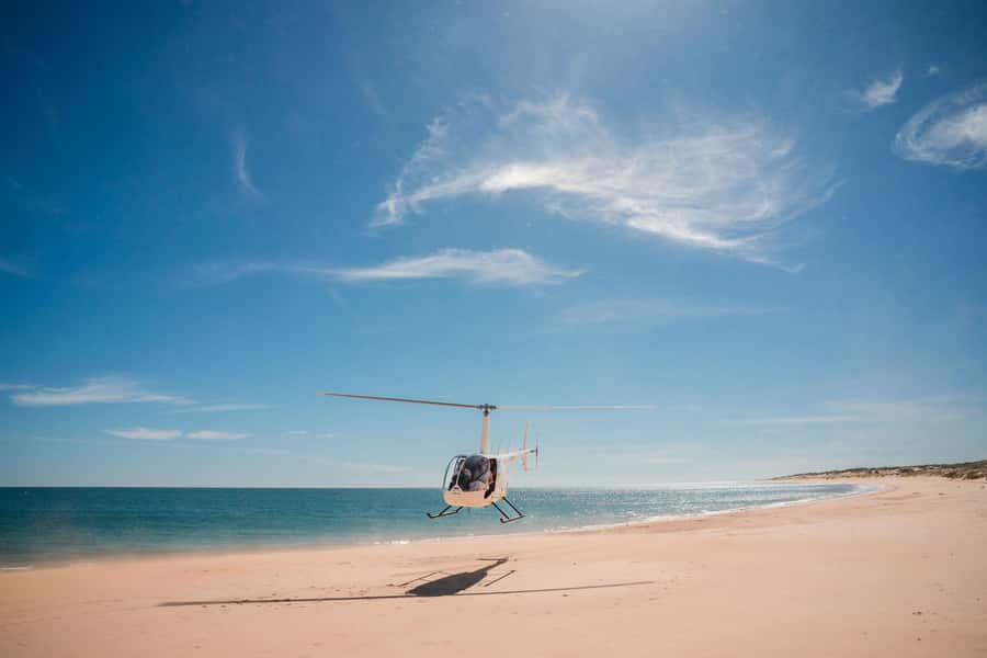From Broome: Eco Beach Explorer Helicopter Flight with Lunch - The return flight over Broome: same route, different mood