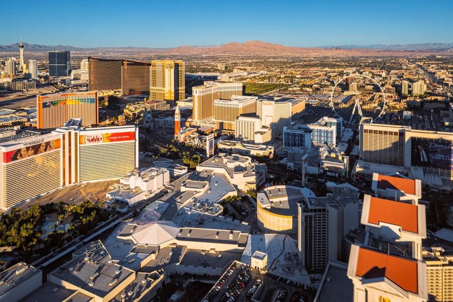 Las Vegas: Red Rock Canyon and Vegas Strip Helicopter Tour - Las Vegas Strip aerial flyover: city lights meet desert contrast