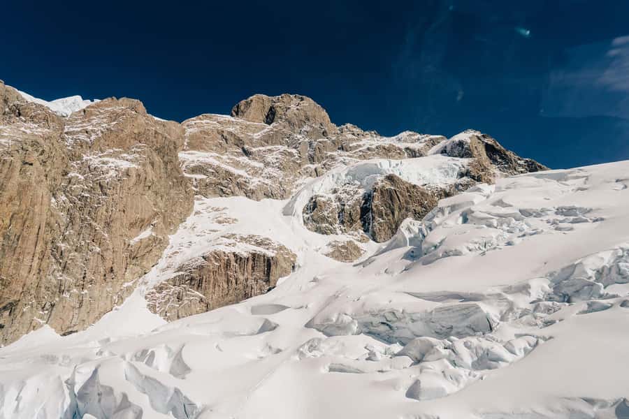 Queenstown: 50-Minute Southern Glacier Helicopter Flight - Glacial icefalls and native forest: the views between peaks